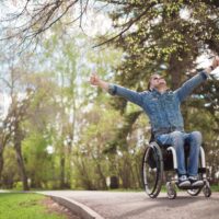 Young Man in Wheelchair_Feeling Happy